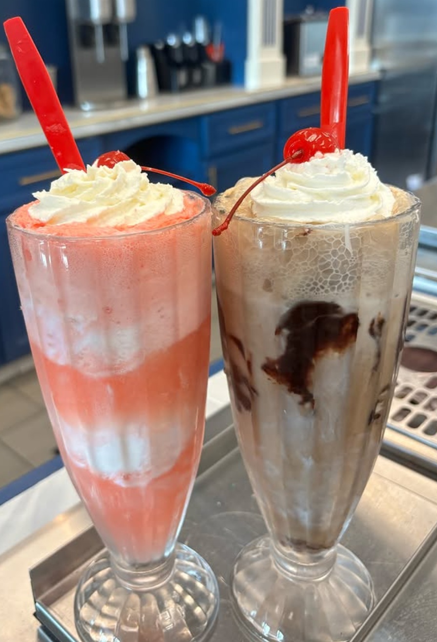 Our chocolate and strawberry shakes in traditional shake glasses